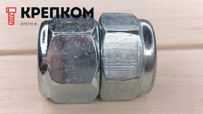 Гайка самоконтрящаяся DIN 985 с нейлоновой вставкой, сталь 10, оцинкованная сталь - фото